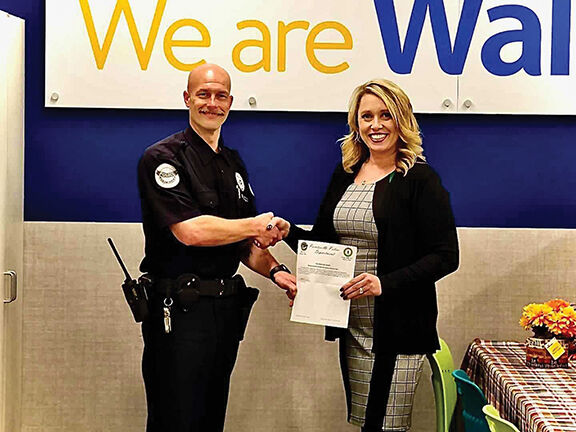 10-7 Walmart police donation.jpg